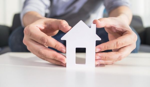 businessmen-hold-house-model-in-hand_1088-1013 businessmen-hold-house-model-in-hand_1088-1013